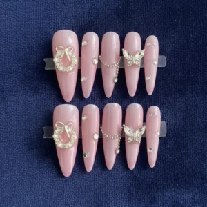 dusty rose butterfly charm press on nails – gold bow & rhinestone almond
