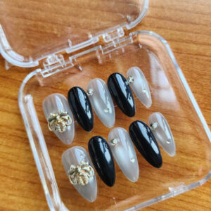 midnight luxe cat eye press on nails | silver ribbon & crystal accents | luxury handmade jelly grey & black almond nails | reusable glue on nails