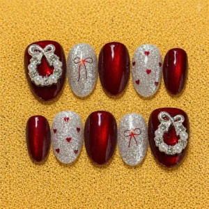 red glitter bow heart nail set